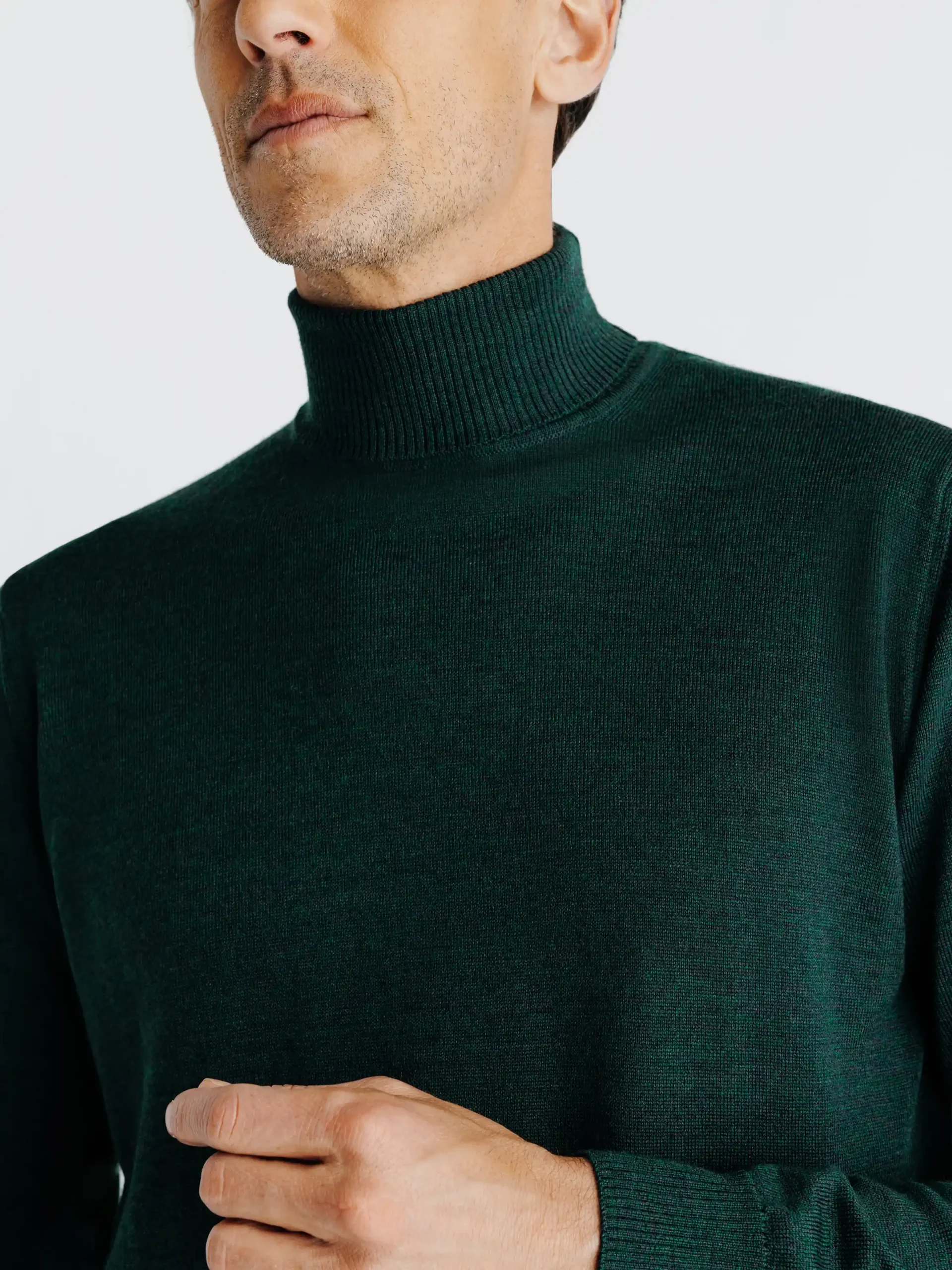 Pull col roulé vert fonce