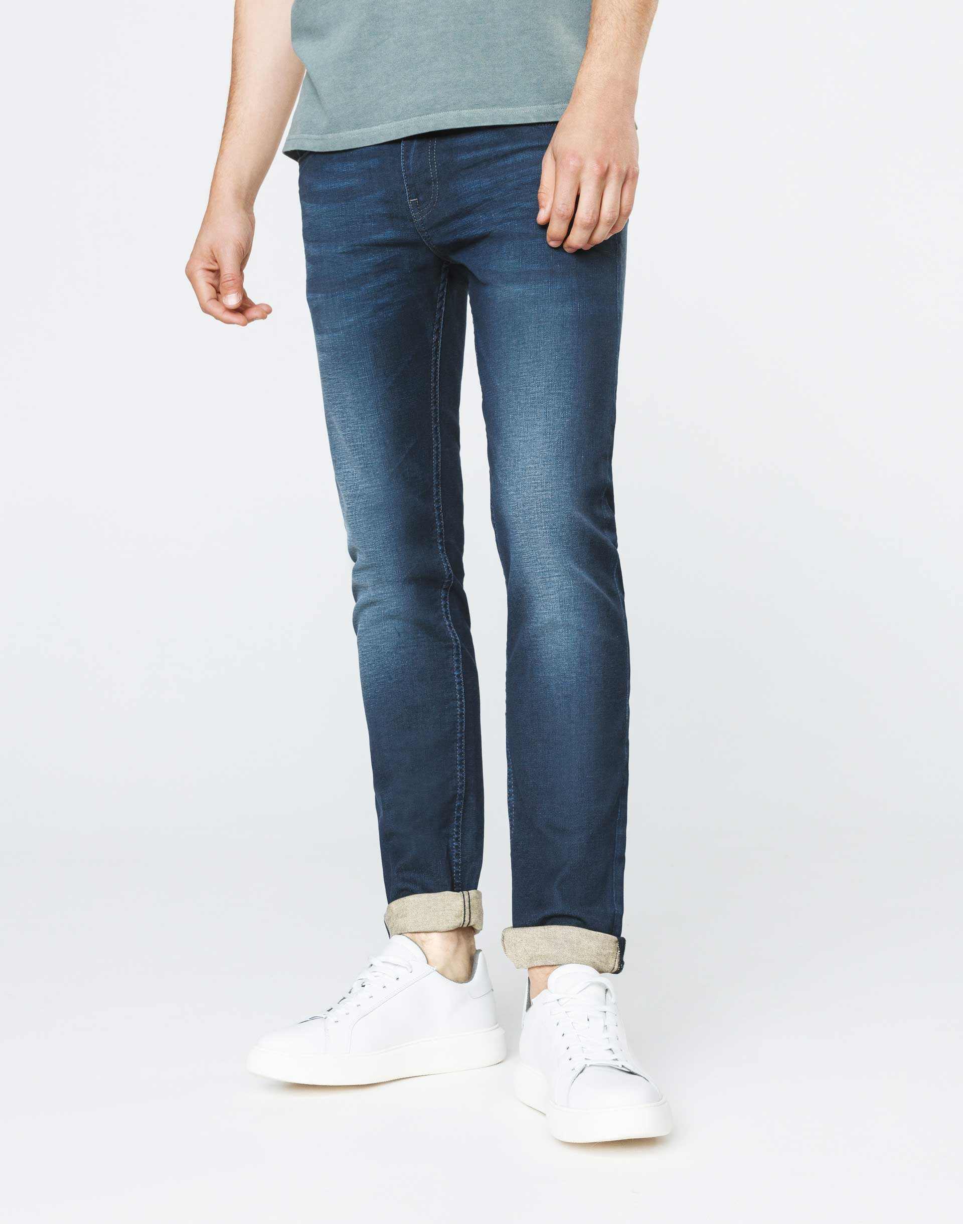 Jean enduit bleu gris délavé